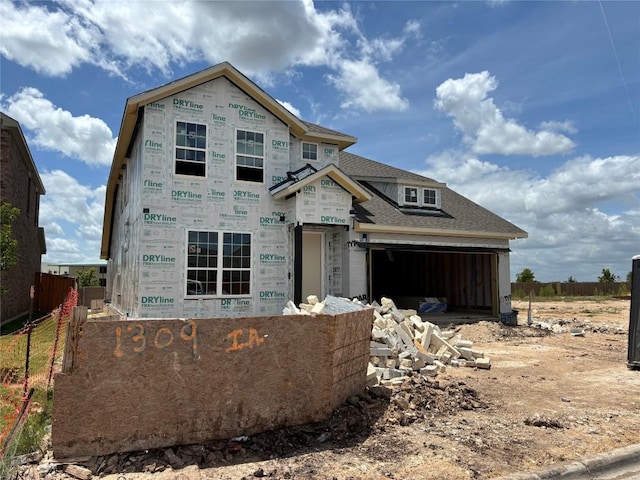 1309 Dog Iron St, Georgetown, TX 78633 - property under construction featuring a garage and a shingled roof