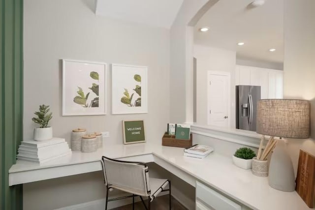 217 Peach Orchard Ln, Georgetown, TX 78628 - office space featuring built in desk, arched walkways, and recessed lighting