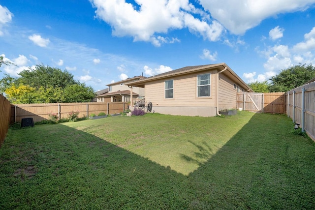 229 Wild Plum, San Marcos, TX 78666 - back of house with a fenced backyard