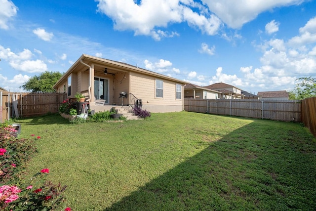 229 Wild Plum, San Marcos, TX 78666 - rear view of property featuring ceiling fan, a fenced backyard, and a patio