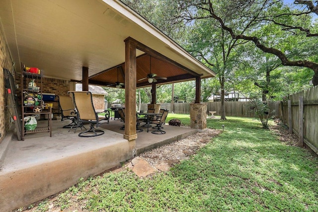 11311 Alhambra Dr, Austin, TX 78759 - fenced backyard with ceiling fan and a patio