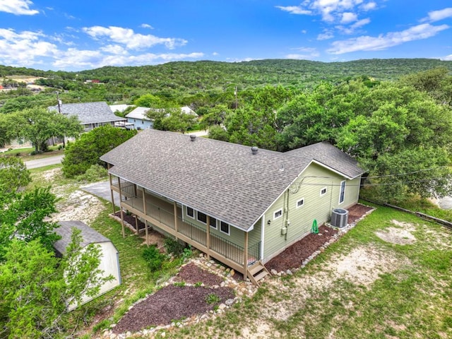 1219 Canyon Trce, Canyon Lake, TX 78133 - view of subject property with a forest