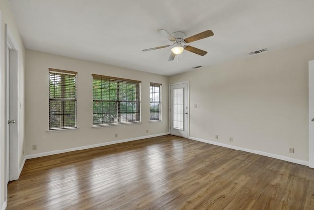 1219 Canyon Trce, Canyon Lake, TX 78133 - empty room featuring a ceiling fan and wood finished floors