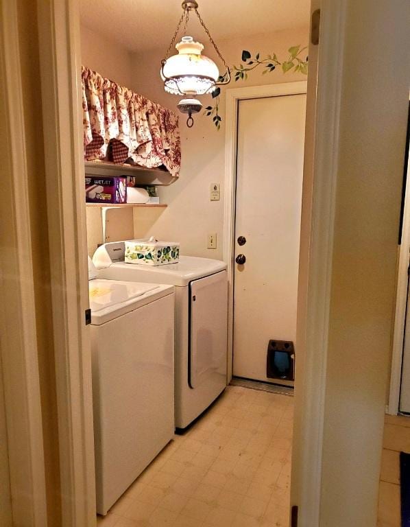 507 Dusty Leather Ct, Pflugerville, TX 78660 - washroom with washing machine and clothes dryer and light floors