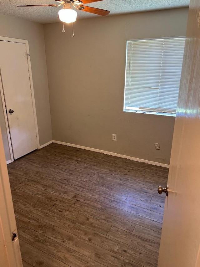 1010 Wayne Dr, Round Rock, TX 78664 - spare room featuring ceiling fan, wood finished floors, and a textured ceiling