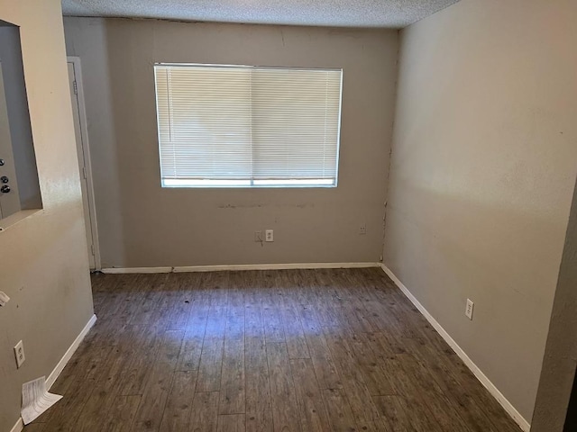 1010 Wayne Dr, Round Rock, TX 78664 - empty room featuring hardwood / wood-style floors and baseboards