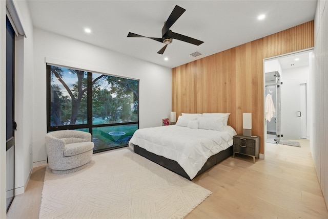 2503 Dip Cv, Austin, TX 78704 - bedroom with wood walls, recessed lighting, wood finished floors, and ceiling fan