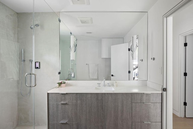 2503 Dip Cv, Austin, TX 78704 - bathroom featuring vanity and a shower stall