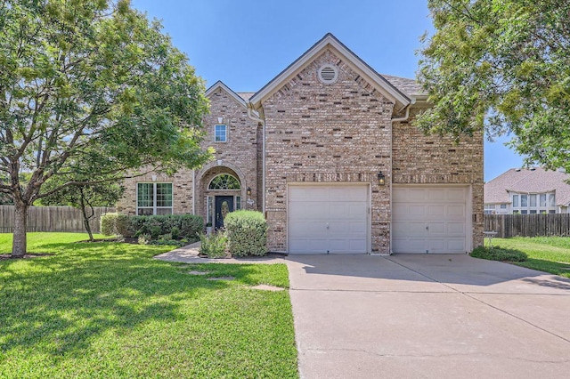 8216 Partridge Bend Cv, Austin, TX 78729 - traditional-style house featuring concrete driveway, brick siding, and a garage