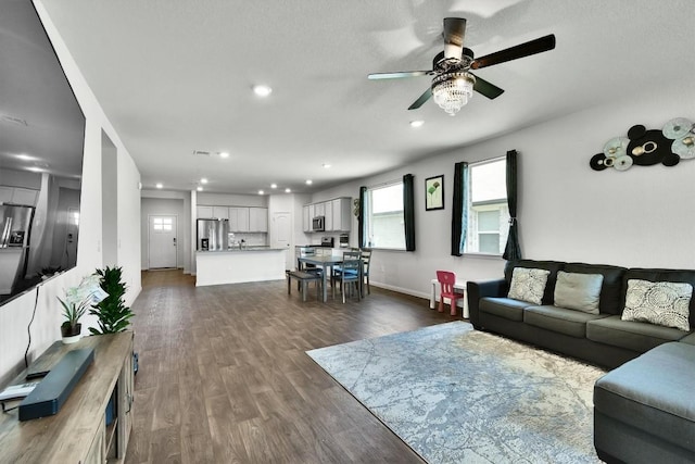 116 Charles Trl, Georgetown, TX 78626 - living area with a ceiling fan, recessed lighting, and dark wood-style flooring