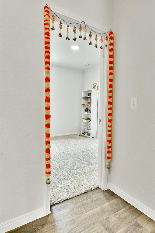 116 Charles Trl, Georgetown, TX 78626 - unfurnished room featuring wood finished floors and baseboards