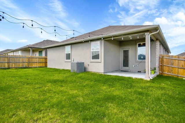116 Charles Trl, Georgetown, TX 78626 - rear view of property featuring stucco siding, a patio, and central AC unit