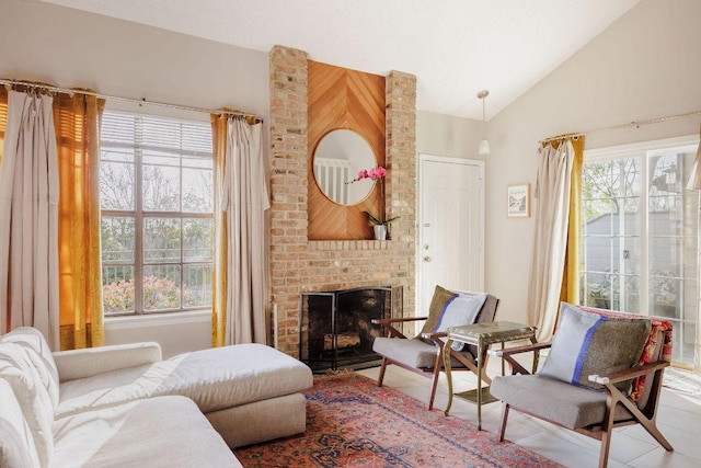1748 Ohlen Rd Unit 14, Austin, TX 78757 - living area featuring vaulted ceiling, a fireplace, and tile patterned floors