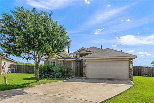 14513 Martial Eagle Dr, Elgin, TX 78621 - single story home with concrete driveway, an attached garage, and brick siding