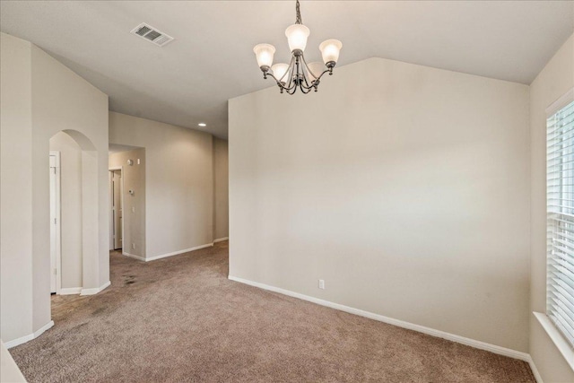 14513 Martial Eagle Dr, Elgin, TX 78621 - carpeted spare room with arched walkways, a chandelier, and healthy amount of natural light