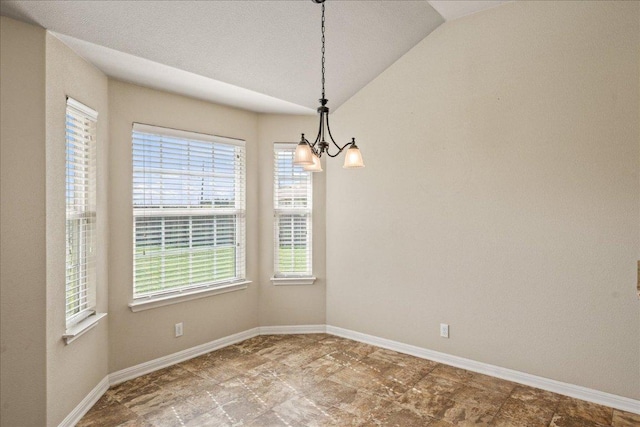 14513 Martial Eagle Dr, Elgin, TX 78621 - empty room featuring a chandelier and lofted ceiling