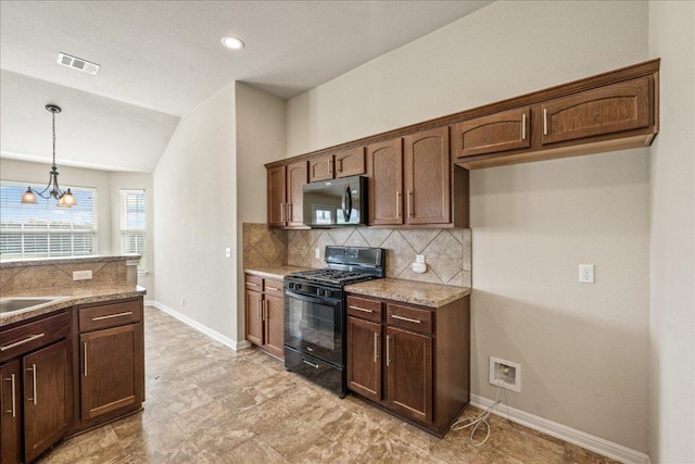 14513 Martial Eagle Dr, Elgin, TX 78621 - kitchen featuring black appliances, tasteful backsplash, hanging light fixtures, lofted ceiling, and dark brown cabinets