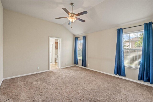 14513 Martial Eagle Dr, Elgin, TX 78621 - carpeted spare room featuring a ceiling fan and lofted ceiling