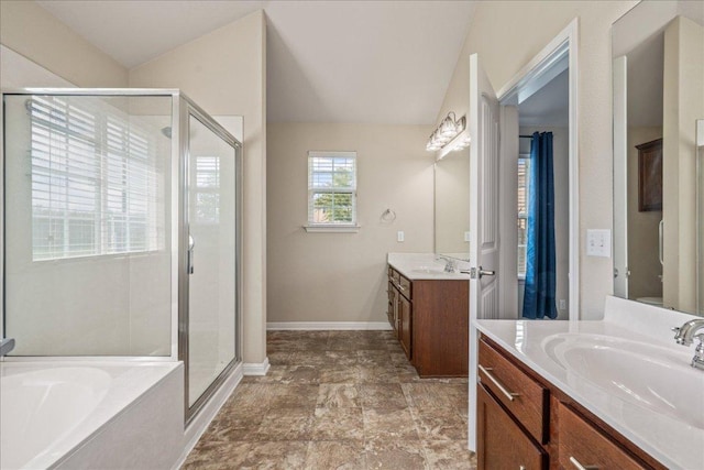14513 Martial Eagle Dr, Elgin, TX 78621 - bathroom with a stall shower, two vanities, and a garden tub
