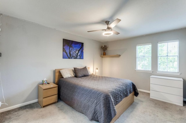 2529 Rio Grande St Unit 51, Austin, TX 78705 - bedroom featuring carpet and a ceiling fan