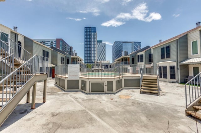 2529 Rio Grande St Unit 51, Austin, TX 78705 - view of patio with stairway and a view of skyline