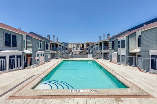 2529 Rio Grande St Unit 51, Austin, TX 78705 - community pool featuring a residential view and a deck