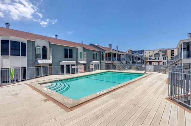 2529 Rio Grande St Unit 51, Austin, TX 78705 - community pool with a residential view and a wooden deck