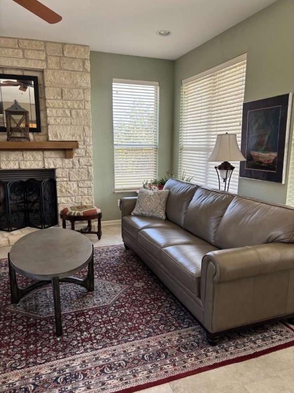 18220 Shepherds Corral, Dripping Springs, TX 78620 - living room with ceiling fan and a fireplace