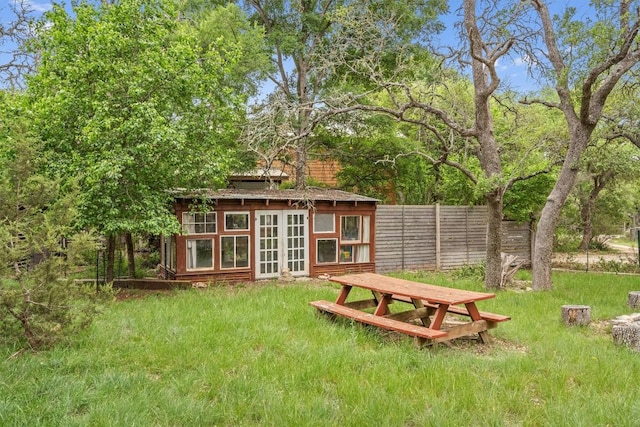 220 River Rapids Rd, Wimberley, TX 78676 - view of yard with french doors and an outdoor structure