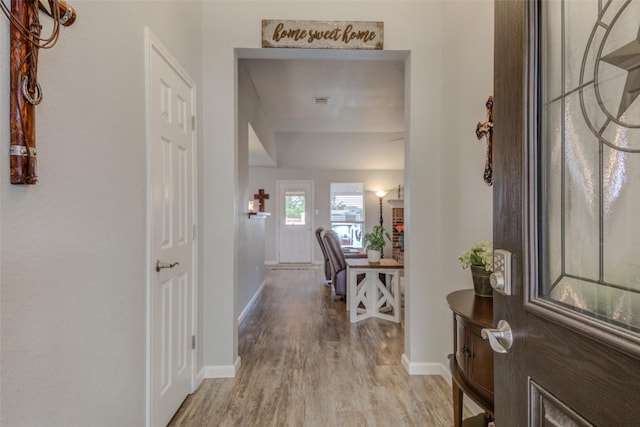 700 Indian Blanket St, Lockhart, TX 78644 - foyer entrance featuring light wood-style flooring and baseboards