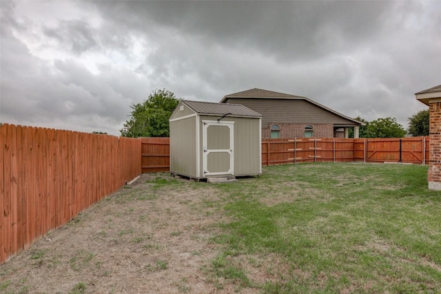 700 Indian Blanket St, Lockhart, TX 78644 - fenced backyard featuring a storage unit