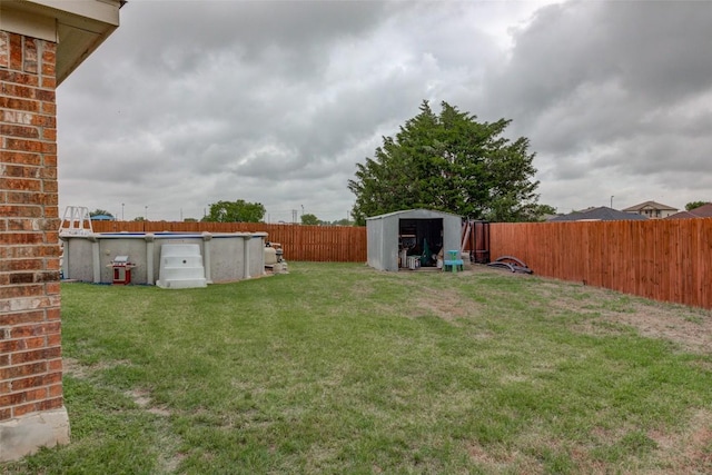 700 Indian Blanket St, Lockhart, TX 78644 - fenced backyard with a storage shed