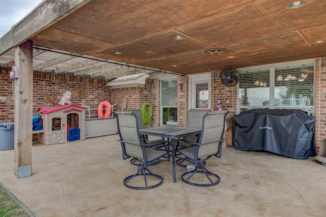 700 Indian Blanket St, Lockhart, TX 78644 - view of patio / terrace with outdoor dining space, area for grilling, and a pergola