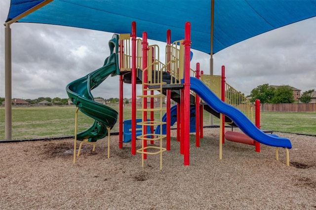 700 Indian Blanket St, Lockhart, TX 78644 - community jungle gym featuring a yard