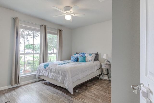 700 Indian Blanket St, Lockhart, TX 78644 - bedroom featuring wood finished floors and a ceiling fan