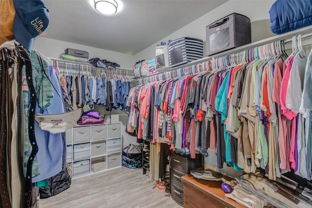 700 Indian Blanket St, Lockhart, TX 78644 - walk in closet with wood finished floors