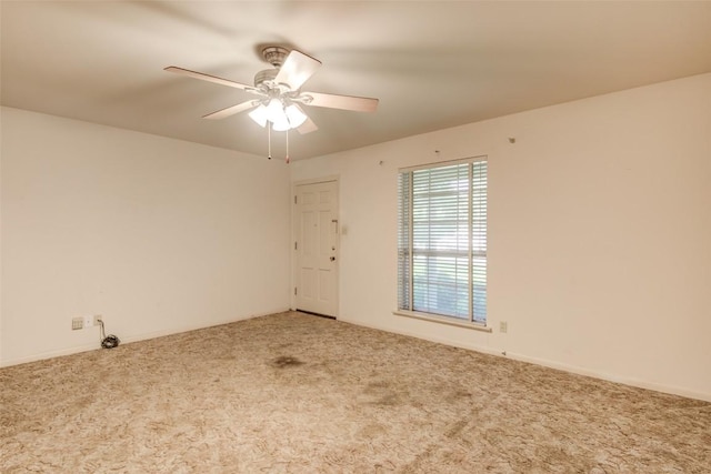 2502 Greenlawn Pkwy, Austin, TX 78757 - carpeted empty room with ceiling fan