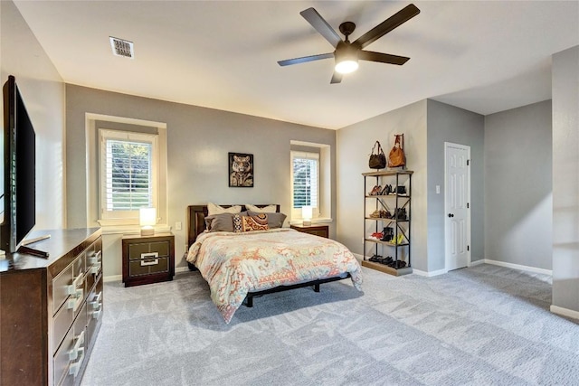 4812 Mantle Dr, Austin, TX 78746 - bedroom featuring baseboards, light colored carpet, multiple windows, and ceiling fan
