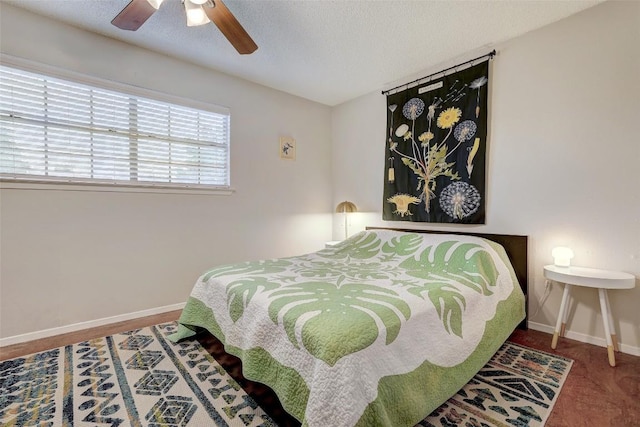 2008 Kenneth Ave Unit B, Austin, TX 78741 - bedroom with baseboards, ceiling fan, and a textured ceiling