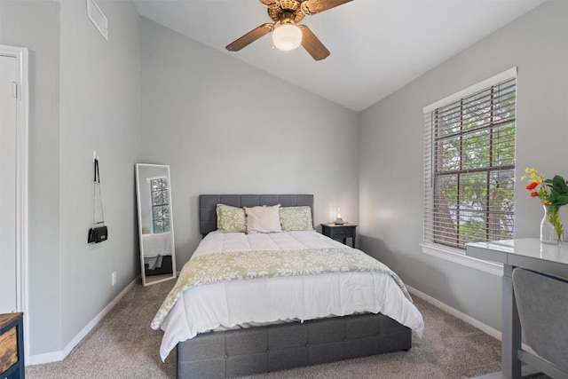 203 E 31st St Unit 304, Austin, TX 78705 - carpeted bedroom with lofted ceiling, baseboards, and a ceiling fan
