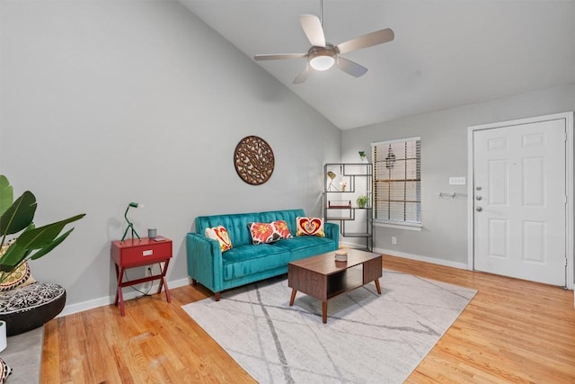 203 E 31st St Unit 304, Austin, TX 78705 - living area featuring wood finished floors, ceiling fan, high vaulted ceiling, and baseboards