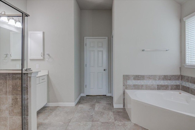 216 Allegrini St, Leander, TX 78641 - bathroom with vanity and a garden tub