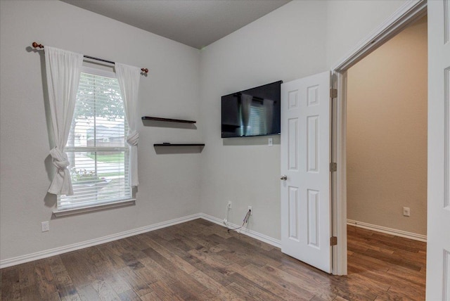 216 Allegrini St, Leander, TX 78641 - spare room featuring wood finished floors and baseboards
