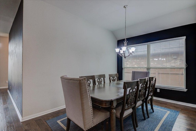 216 Allegrini St, Leander, TX 78641 - dining space with wood finished floors, a chandelier, and lofted ceiling