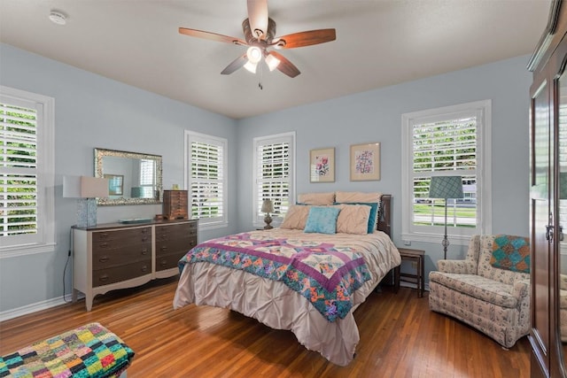 1922 W Lake Dr, Taylor, TX 76574 - bedroom with wood finished floors and ceiling fan