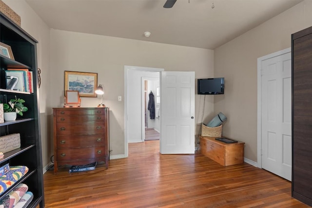 1922 W Lake Dr, Taylor, TX 76574 - bedroom with wood finished floors and ceiling fan