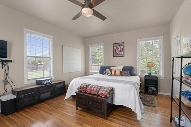 1922 W Lake Dr, Taylor, TX 76574 - bedroom featuring wood finished floors and ceiling fan