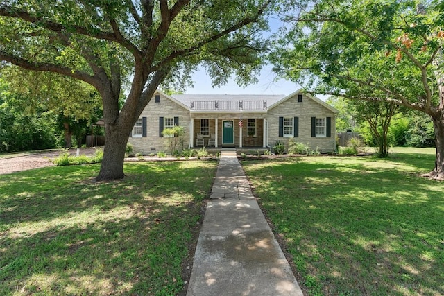 1922 W Lake Dr, Taylor, TX 76574 - view of front of property featuring stone siding and a front yard