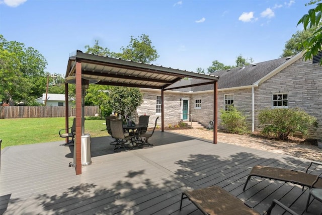 1922 W Lake Dr, Taylor, TX 76574 - wooden terrace with outdoor dining area
