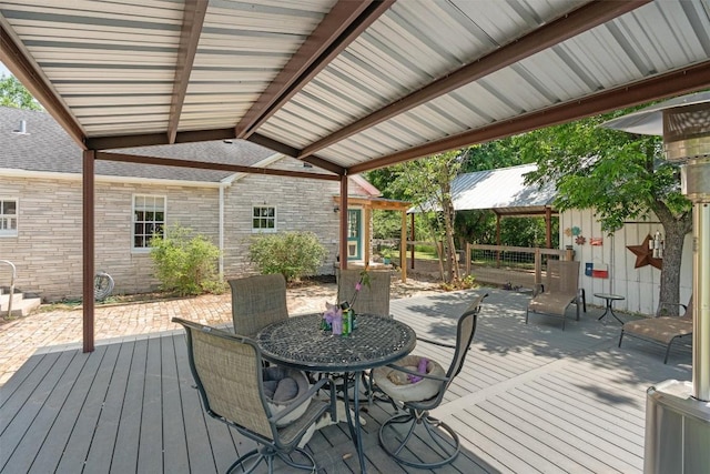1922 W Lake Dr, Taylor, TX 76574 - wooden terrace with outdoor dining space